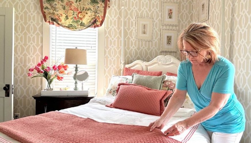 Rhonda Staley IIDA Iowa Blog How to Make the Most of Your Guest Room making the bed