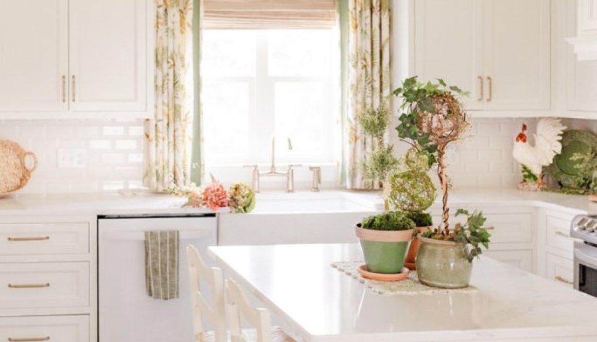 My farmhouse kitchen with two pendants and coordinating wall lamp