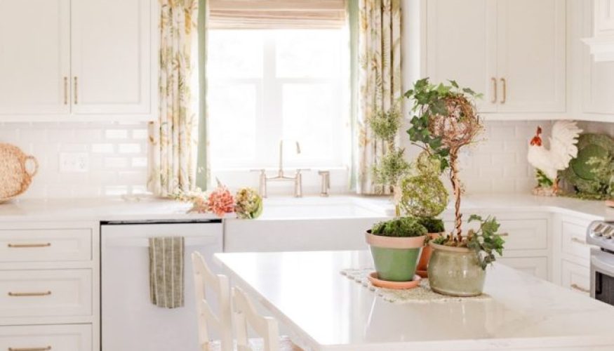 My farmhouse kitchen with two pendants and coordinating wall lamp